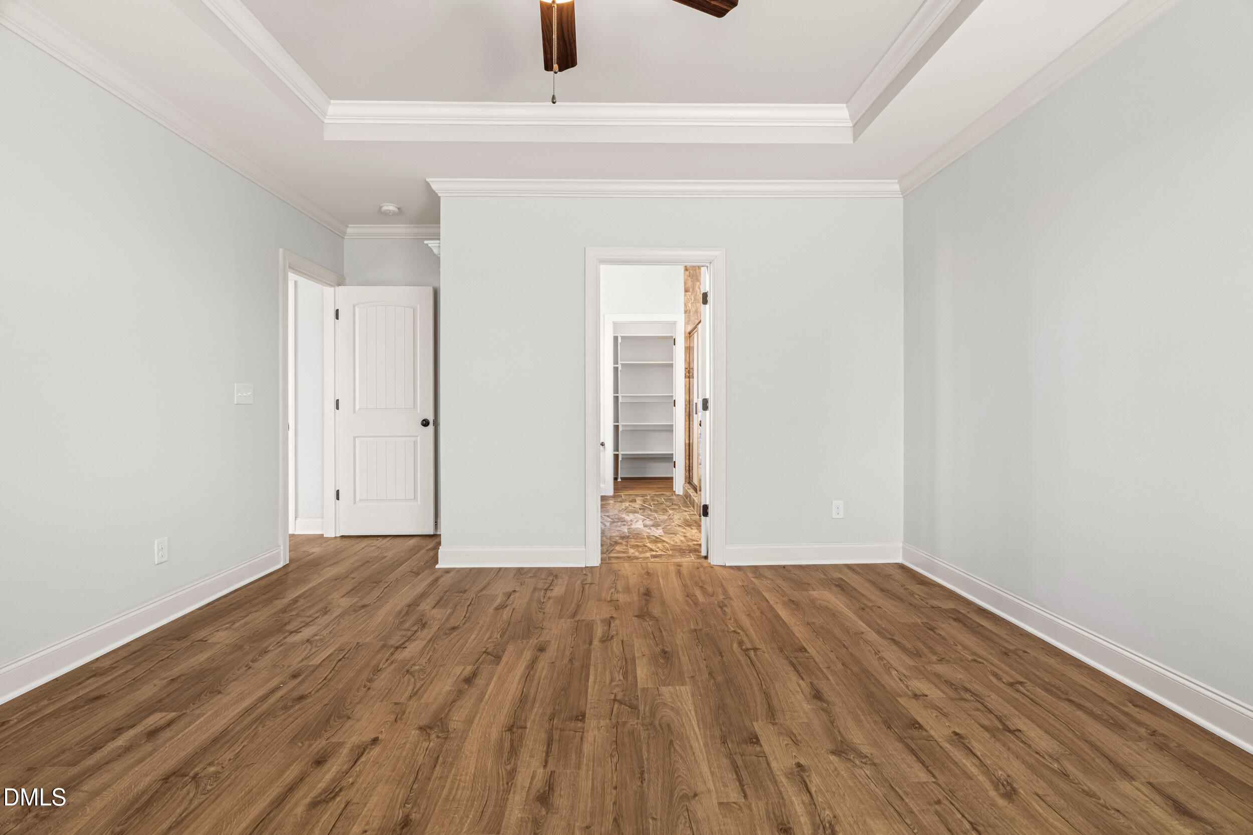 86 Sharpstone Lane Clayton, NC 27527 - Photo 19 of 36 a view of an empty room with wooden floor