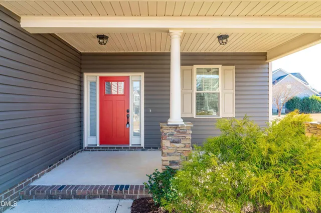 a view of gallery with wooden floor and stairs
