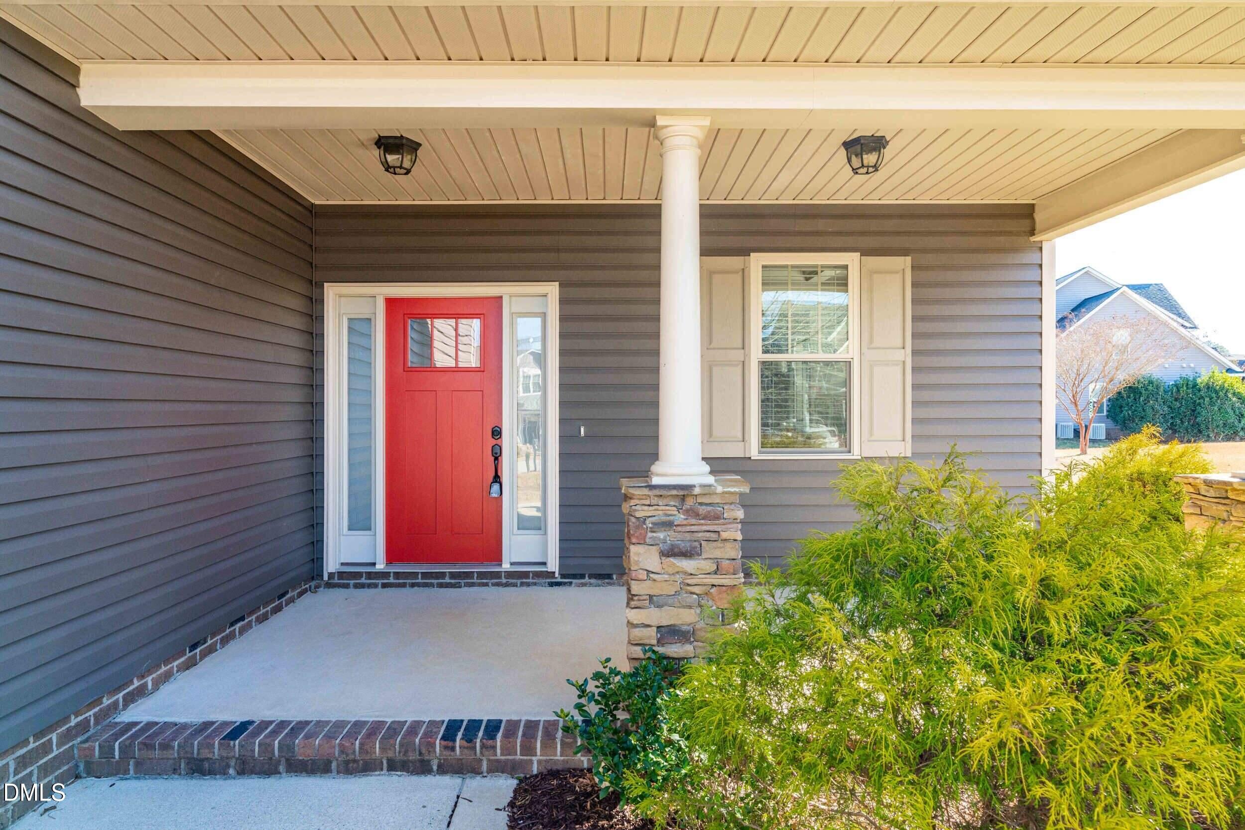 86 Sharpstone Lane Clayton, NC 27527 - Photo 2 of 36 a view of front door of house