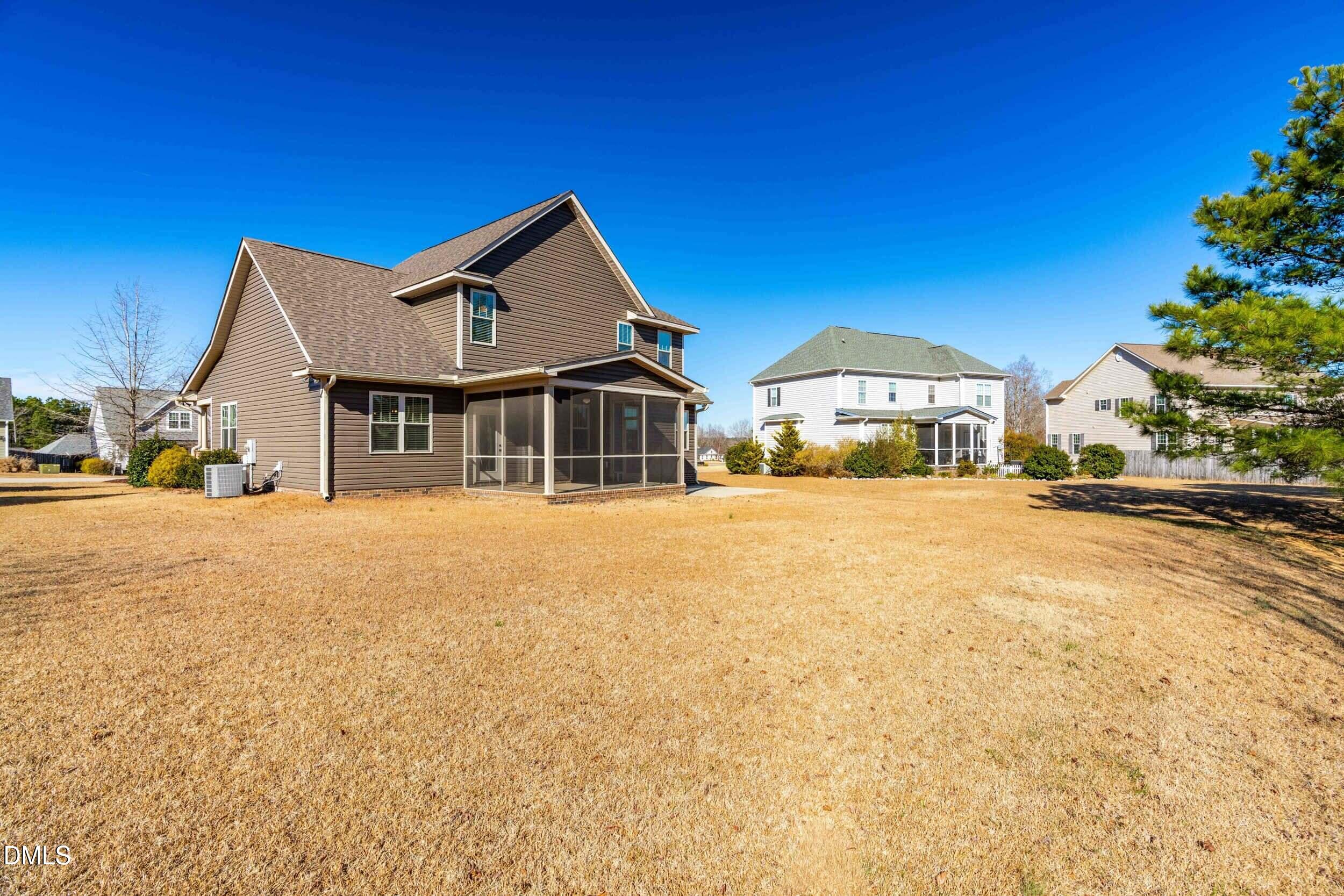 86 Sharpstone Lane Clayton, NC 27527 - Photo 31 of 36 a front view of a house with a yard