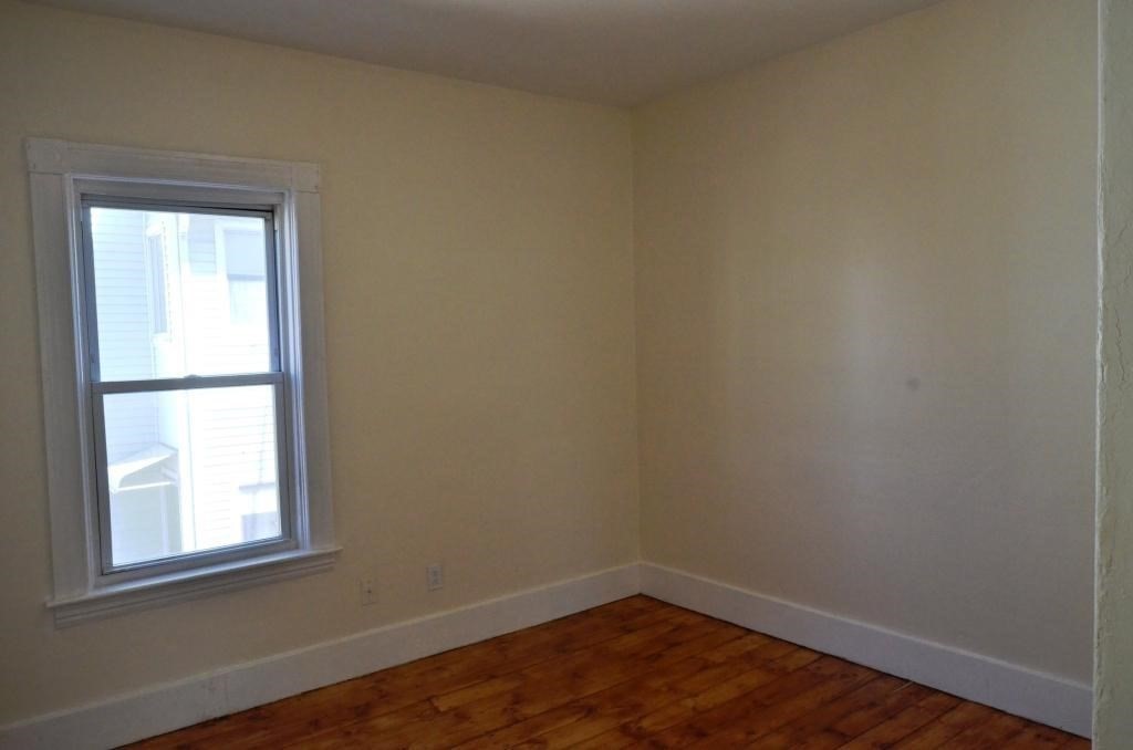 71 Esther Street, Unit 2 Worcester, MA 01607 - Photo 12 of 19 an empty room with a window