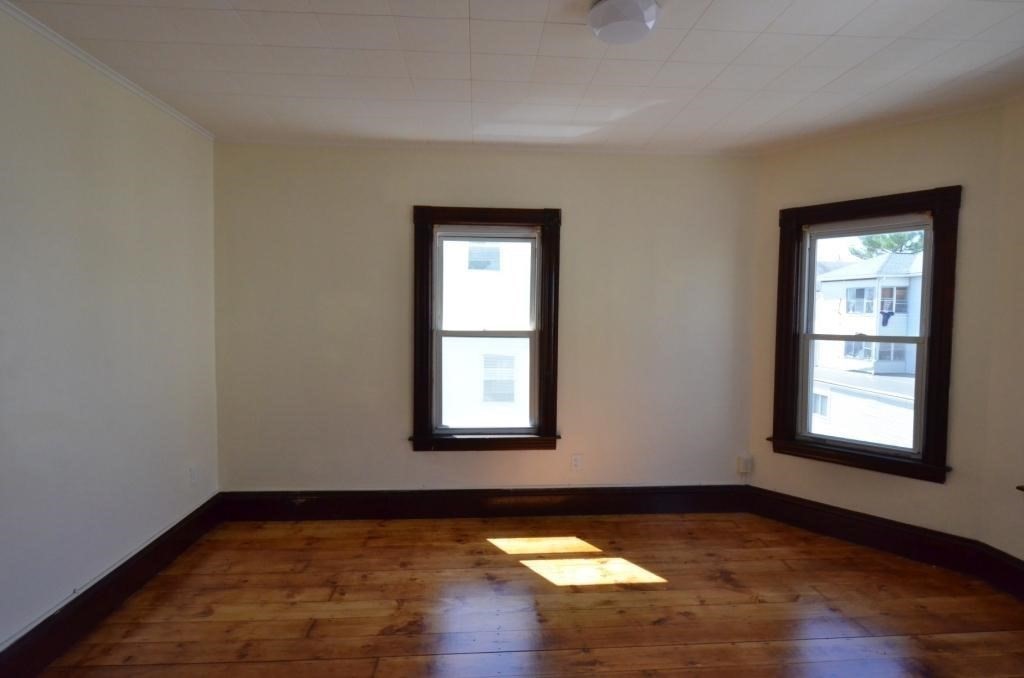 71 Esther Street, Unit 2 Worcester, MA 01607 - Photo 6 of 19 an empty room with window