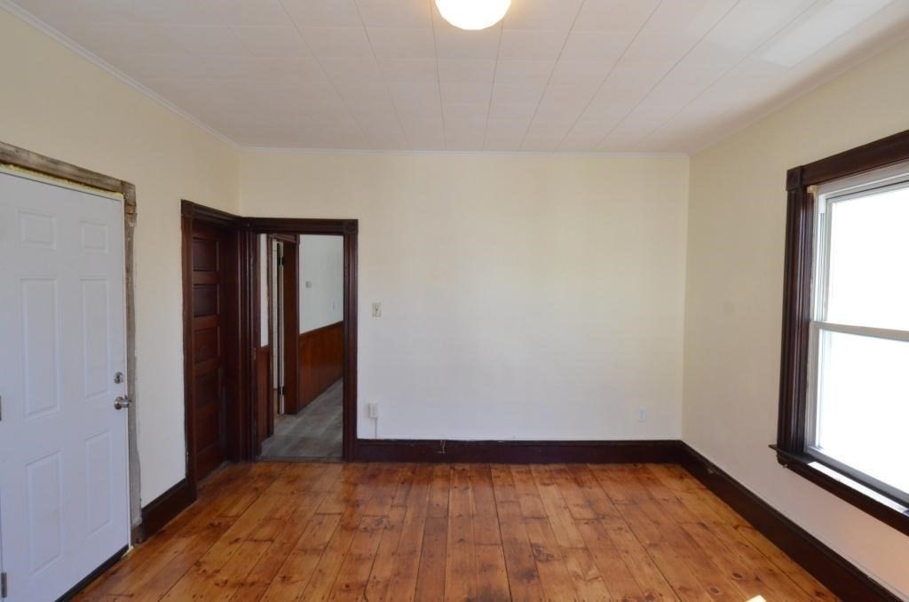 71 Esther Street, Unit 2 Worcester, MA 01607 - Photo 7 of 19 a view of an empty room and window