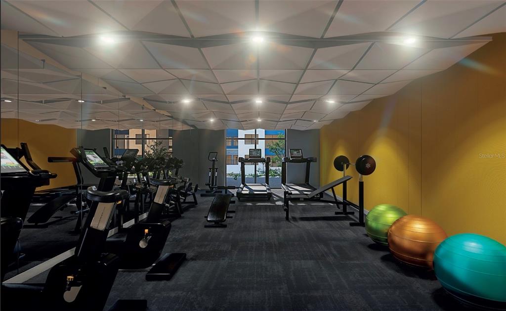 3101 Old Archer Road, Unit 405 Gainesville, FL 32608 - Photo 13 of 18 a view of a room with gym equipment