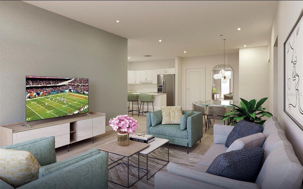 3101 Old Archer Road, Unit 405 Gainesville, FL 32608 - Photo 4 of 18 a living room with furniture and a potted plant