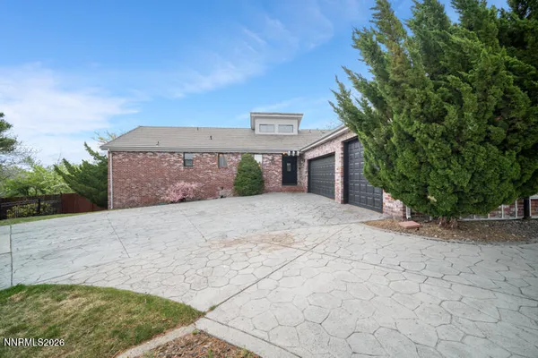 a front view of a house with a garage