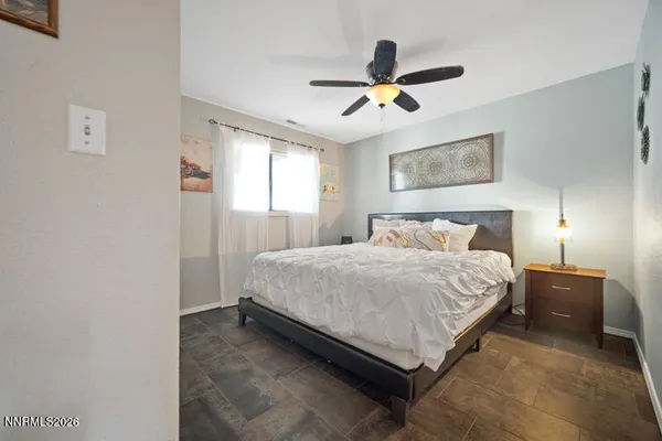 a view of balcony with wooden floor and fence