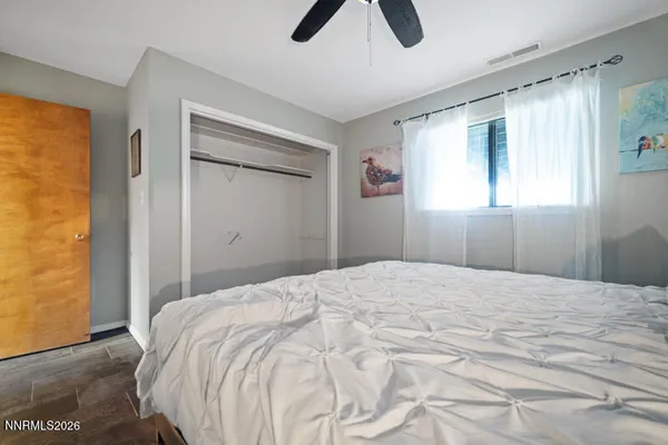 a view of a house with a yard porch and sitting area