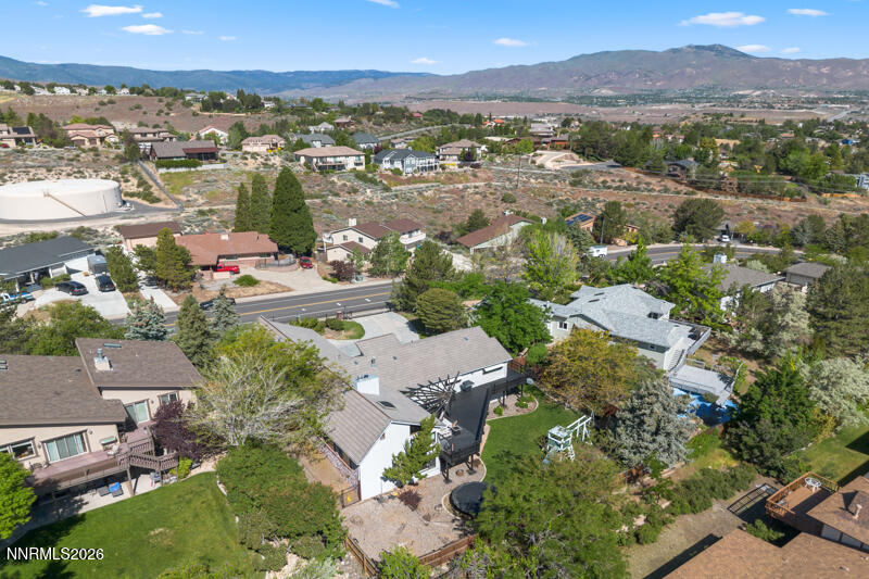 3625 Cashill Boulevard Reno, NV 89509 - Photo 62 of 65 an aerial view of a city with lots of residential buildings and mountain view in back