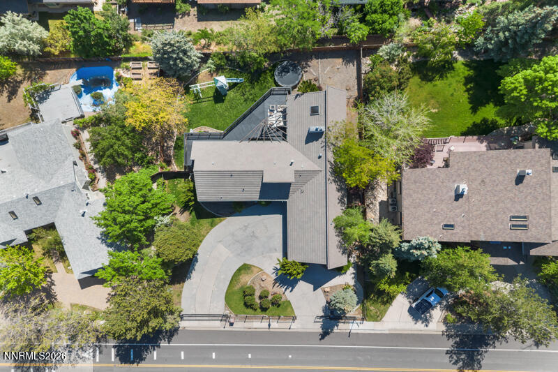 3625 Cashill Boulevard Reno, NV 89509 - Photo 65 of 65 an aerial view of a house with a yard and garden
