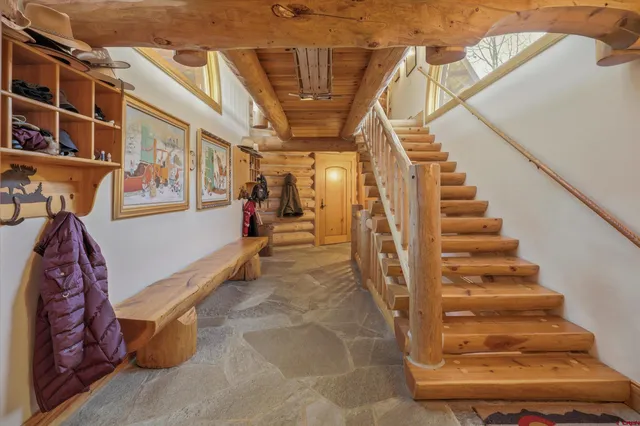 a view of entryway with a front door