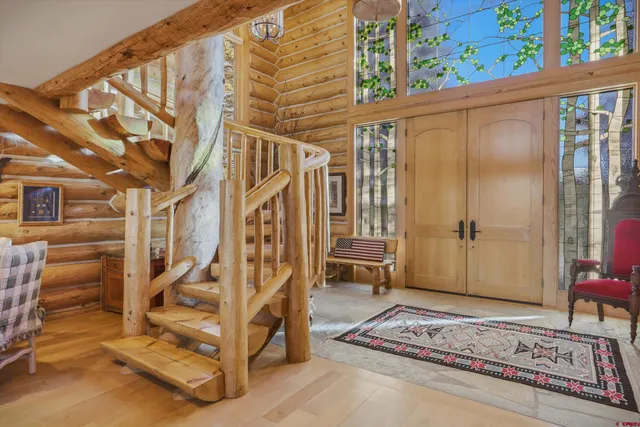 a view of an entryway with staircase