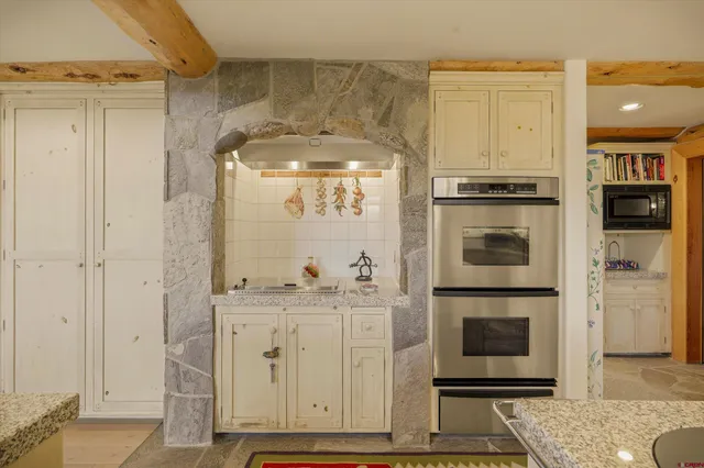 an entryway with a fireplace