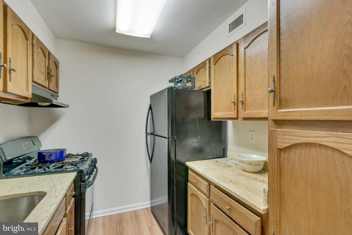 5837 Cove Landing Road, Unit 203 Burke, VA 22015 - Photo 12 of 25 Updated kitchen