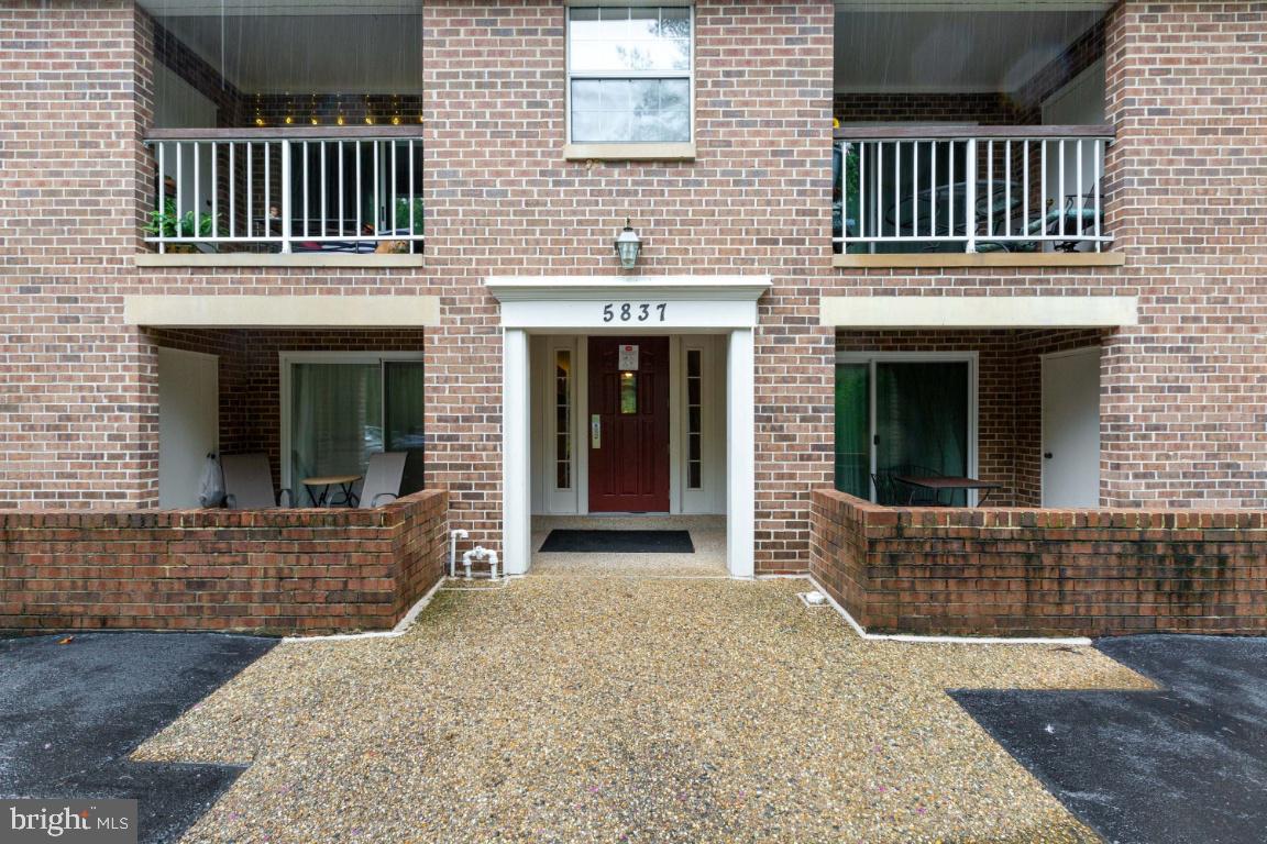 5837 Cove Landing Road, Unit 203 Burke, VA 22015 - Photo 3 of 25 Front