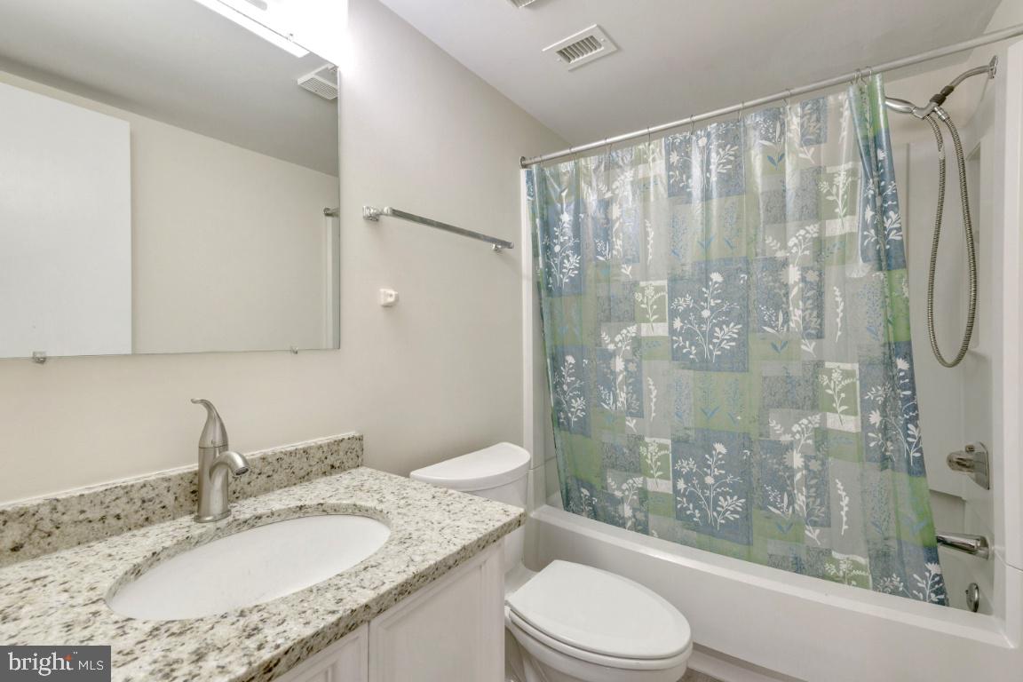 5837 Cove Landing Road, Unit 203 Burke, VA 22015 - Photo 21 of 25 Updated hall bath
