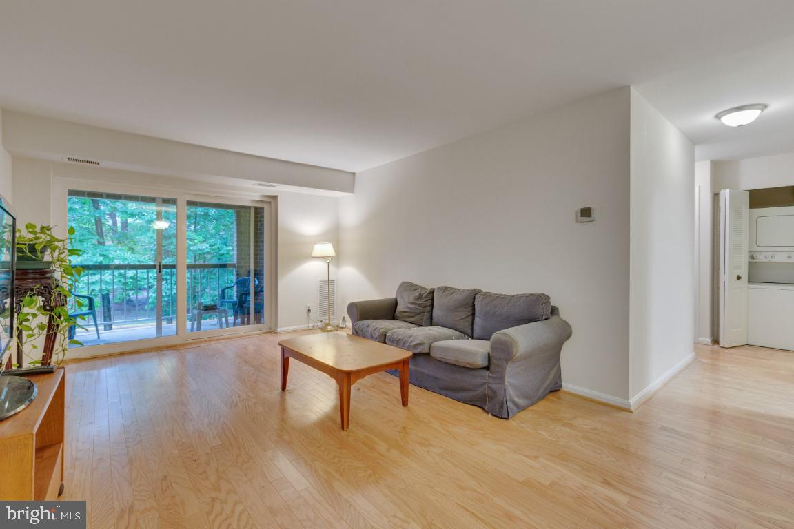 5837 Cove Landing Road, Unit 203 Burke, VA 22015 - Photo 4 of 25 Open concept living room