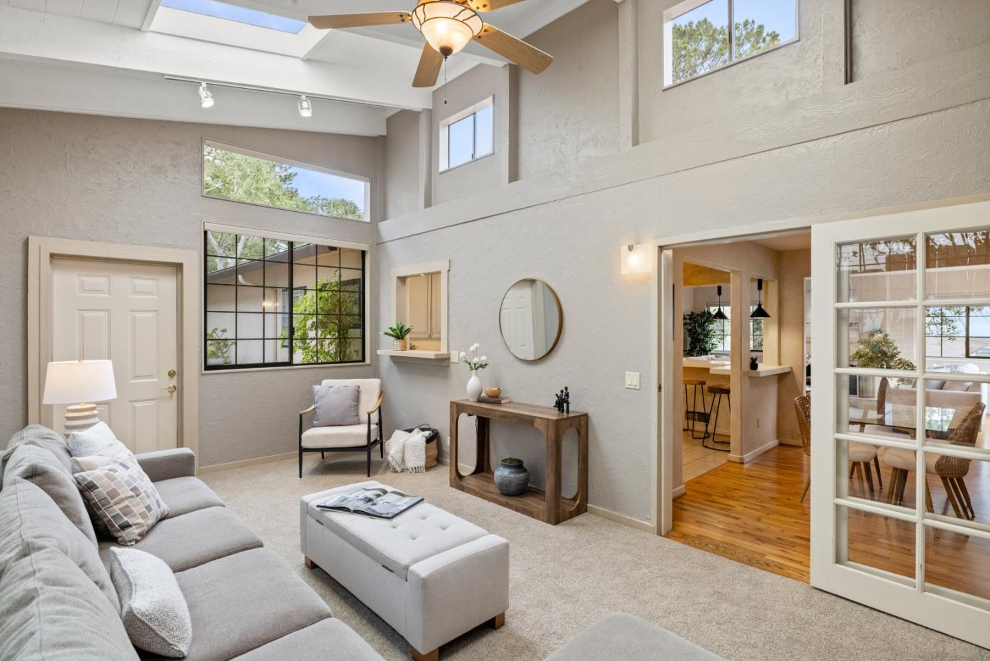 777 Parcel Street Monterey, CA 93940 - Photo 8 of 21 a living room with furniture a rug and a large window