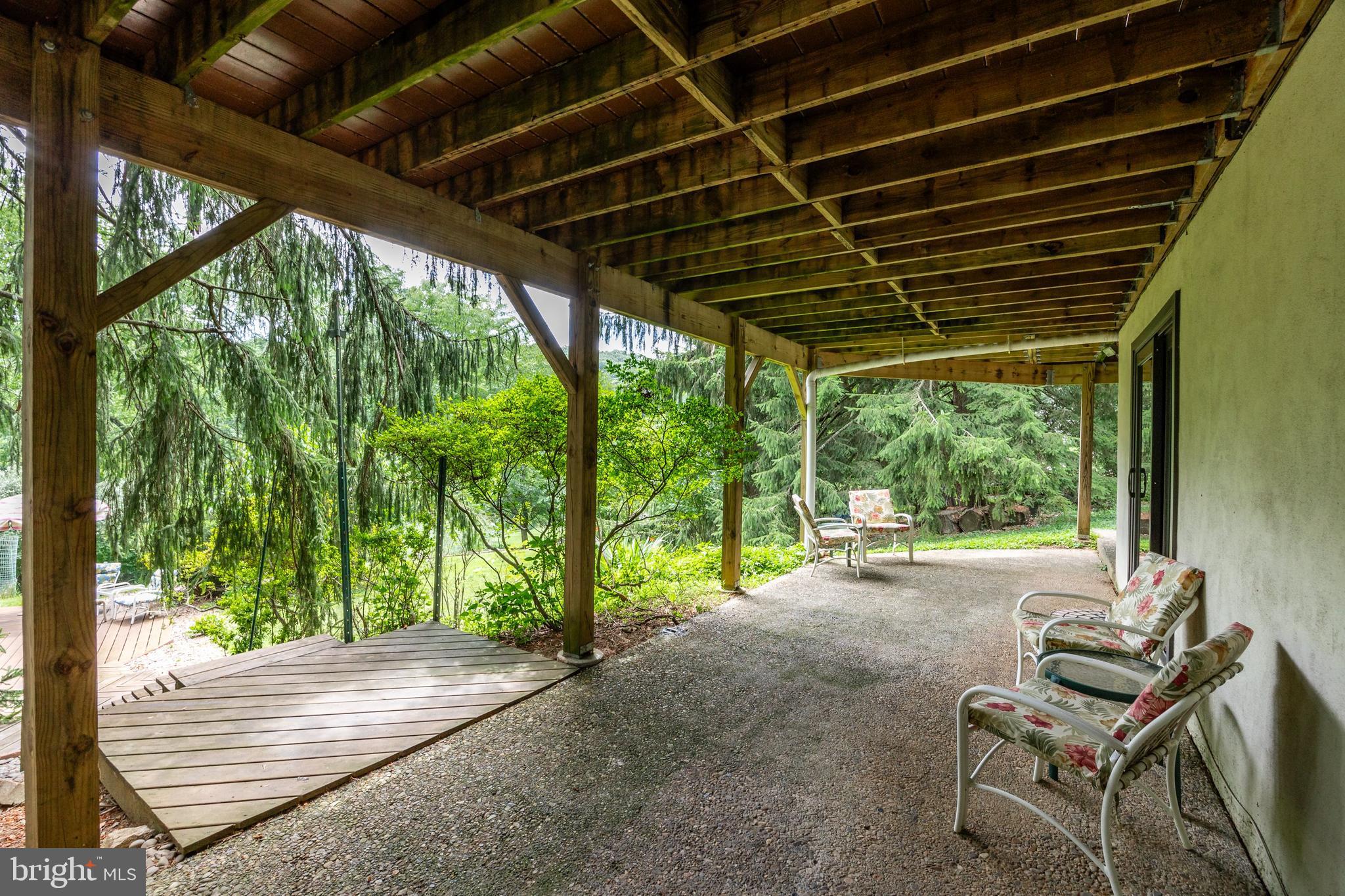 2 Mountain View Lane Phoenixville, PA 19460 - Photo 45 of 55 Shaded Patio Overlooking Pool
