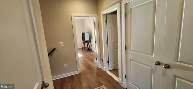 a view of a ocean with a building in the background