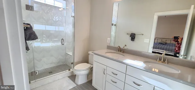 a view of a house with wooden deck