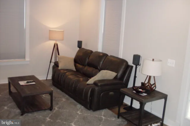 a view of a hallway with staircase