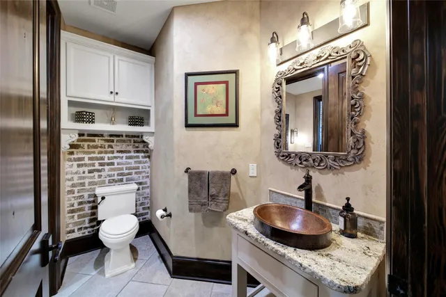 a bedroom with furniture and flat screen tv
