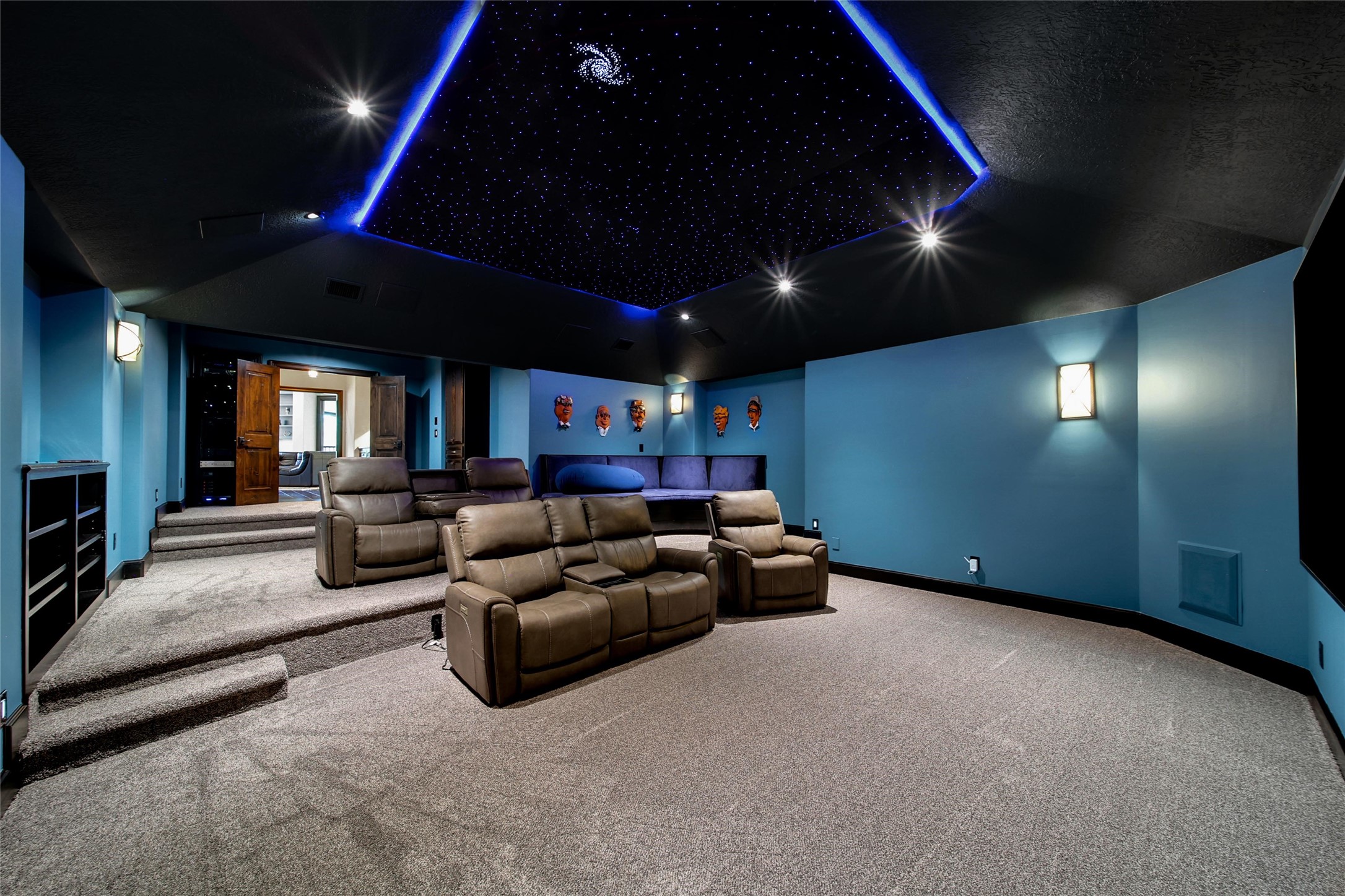 2 Highclere Park Drive Spring, TX 77379 - Photo 26 of 50 This recently modernized home theater delivers a true cinematic experience without ever leaving home. This large space easily accommodates tiered seating options (plus a built-in couch), dimmable lighting to set the perfect mood, and a customizable fiber-optic starry night ceiling that adds a touch of magic to every movie night. This space is designed for immersive entertainment in total comfort.