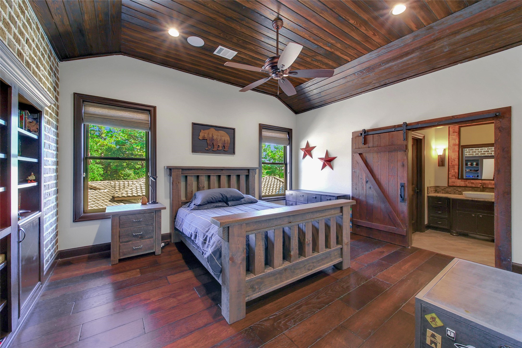 2 Highclere Park Drive Spring, TX 77379 - Photo 27 of 50 The secondary bedrooms are spacious and bright with generous walk-in closets with custom storage.