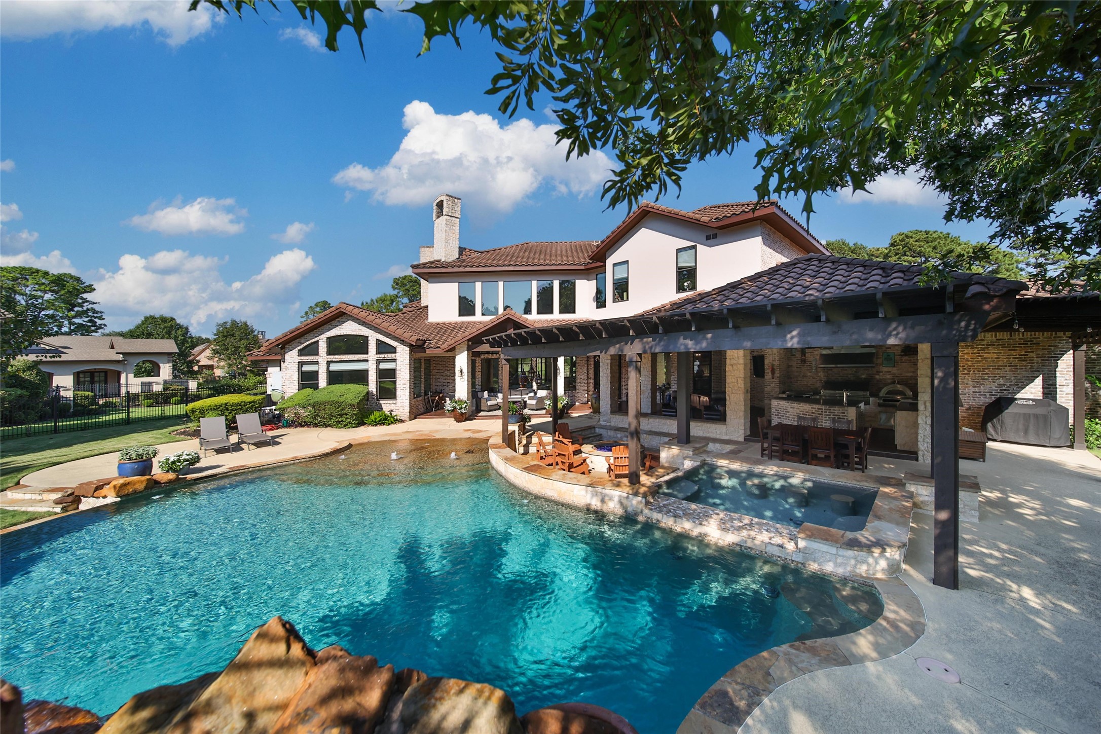 2 Highclere Park Drive Spring, TX 77379 - Photo 35 of 50 Step into resort-style living—this exceptional backyard transforms every day into a getaway.