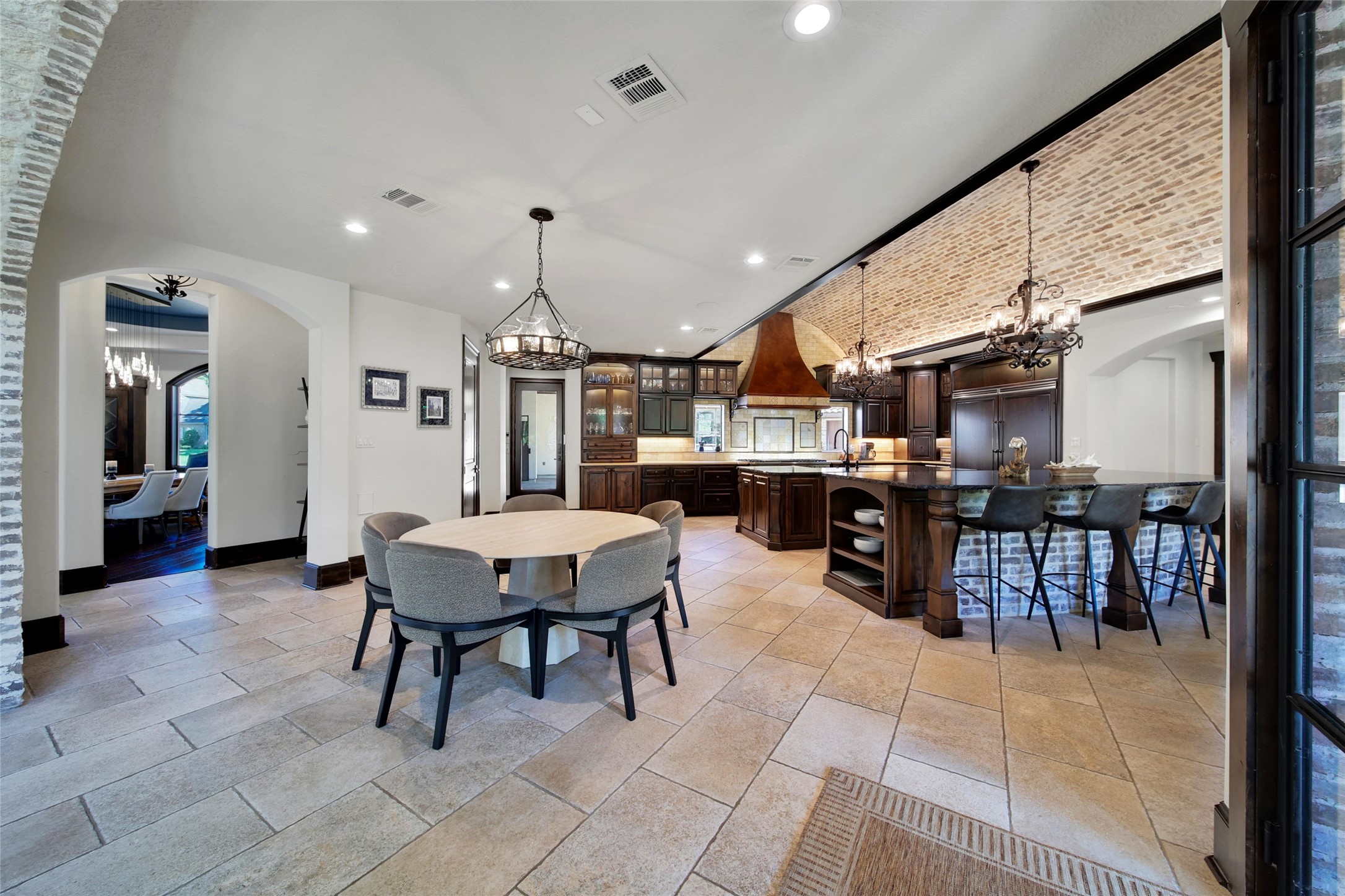 2 Highclere Park Drive Spring, TX 77379 - Photo 7 of 50 The casual dining area is centrally located and easily accessible from the kitchen, family room, and dining room - great for larger gatherings.