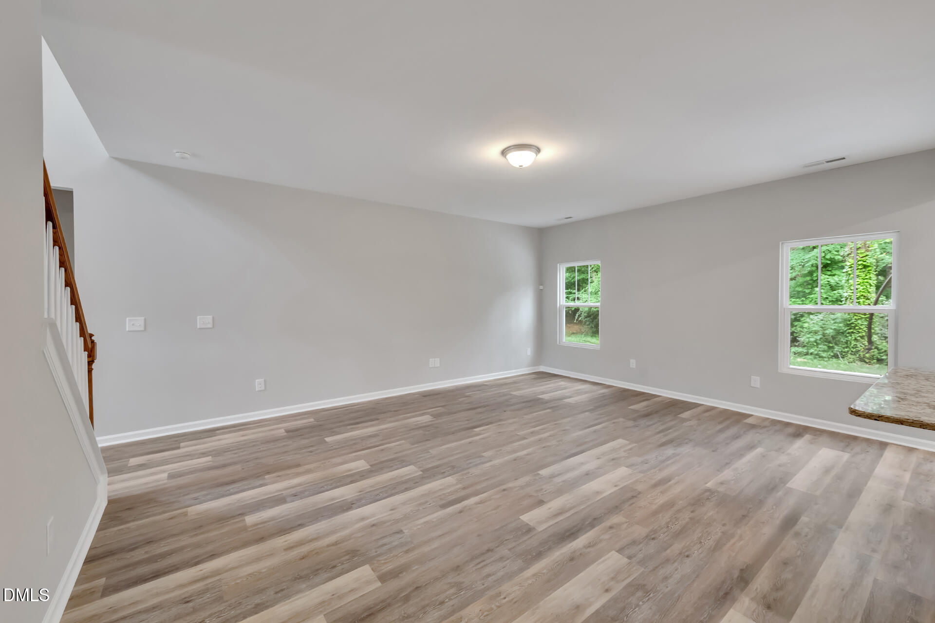 5317 Fayetteville Road, Unit A Durham, NC 27713 - Photo 14 of 50 wooden floor in an empty room with a window