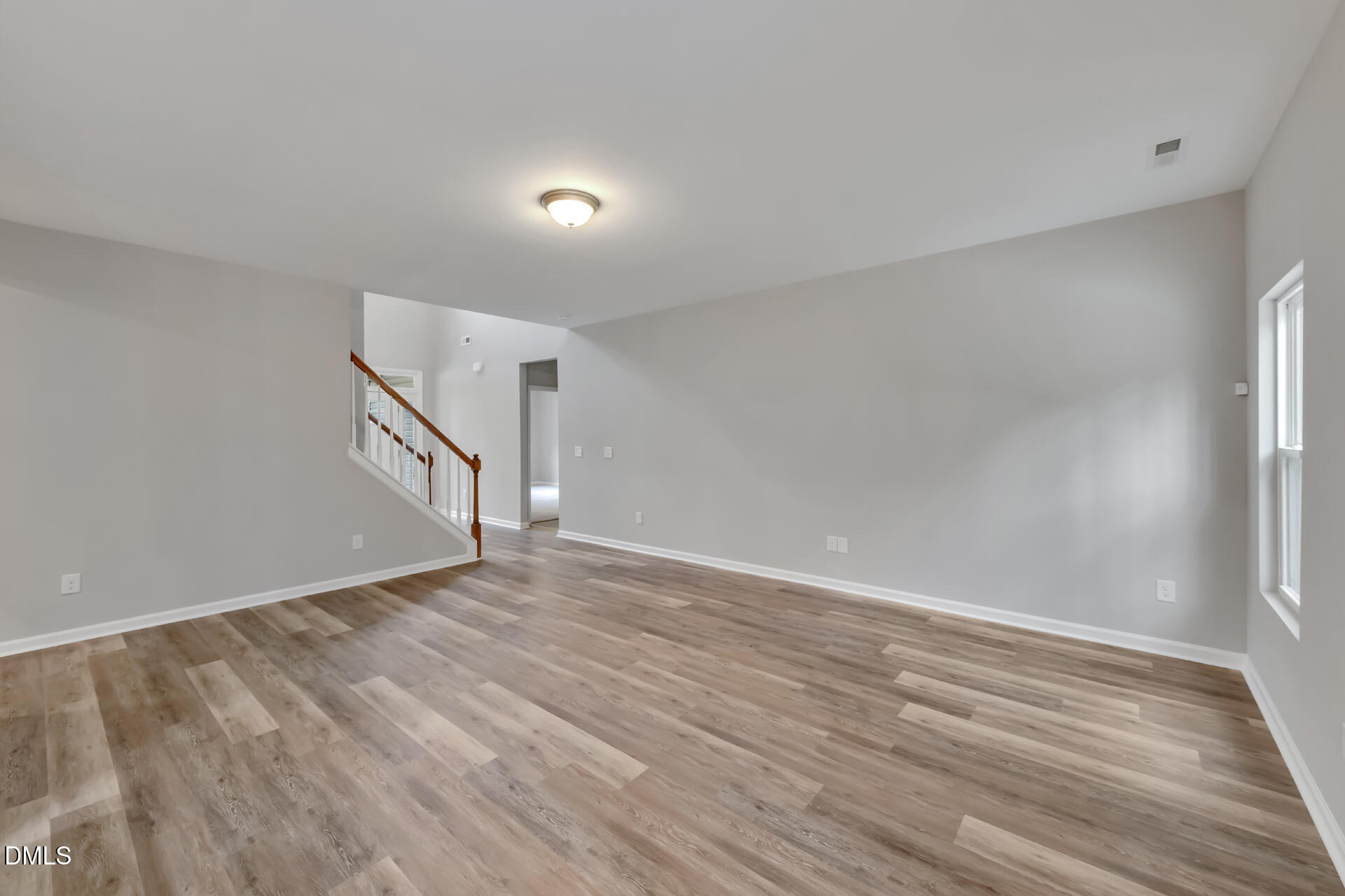 5317 Fayetteville Road, Unit A Durham, NC 27713 - Photo 15 of 50 a view of an empty room with wooden floor