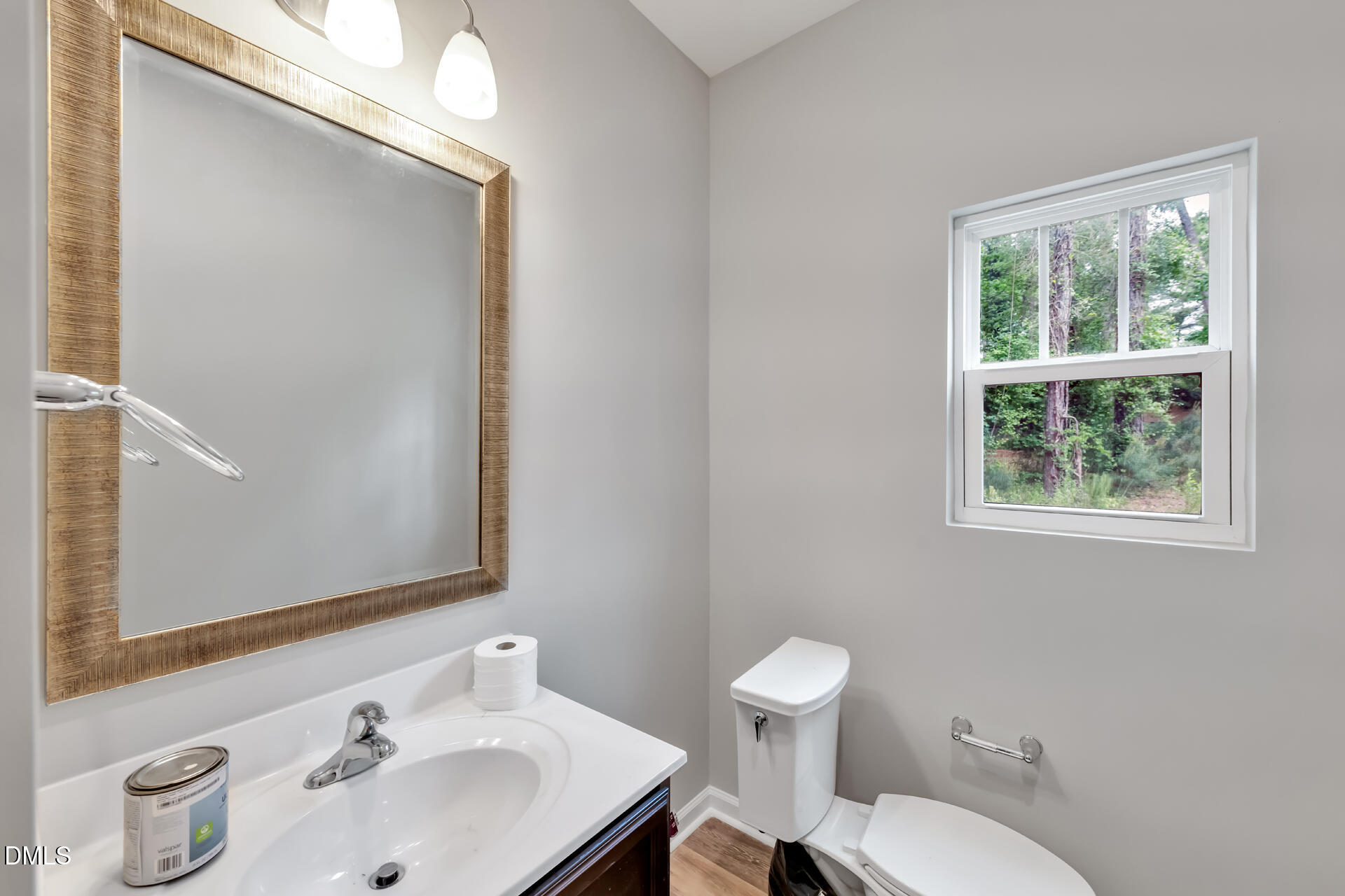 5317 Fayetteville Road, Unit A Durham, NC 27713 - Photo 22 of 50 a bathroom with a toilet sink and mirror
