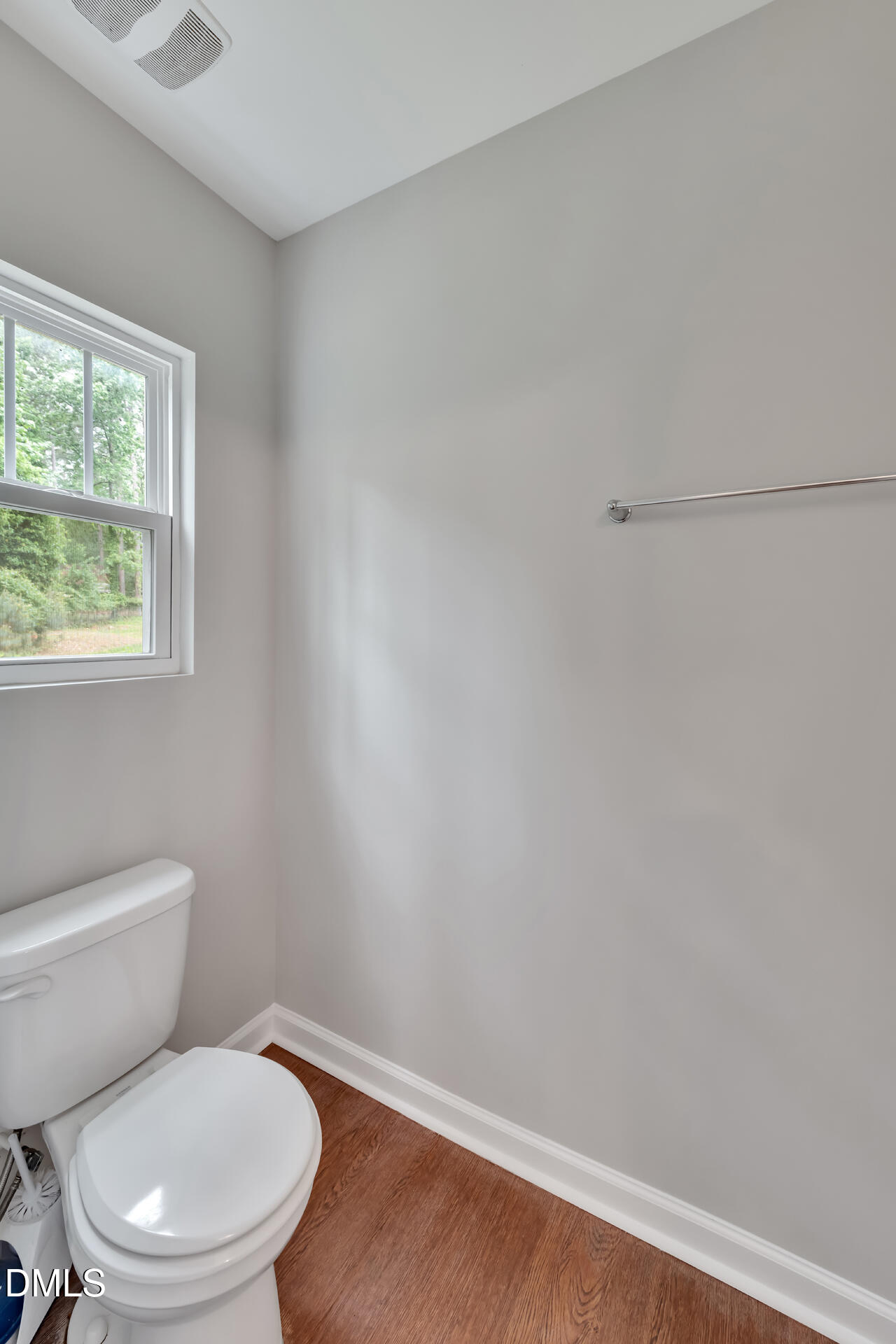 5317 Fayetteville Road, Unit A Durham, NC 27713 - Photo 26 of 50 a white toilet sitting next to a window