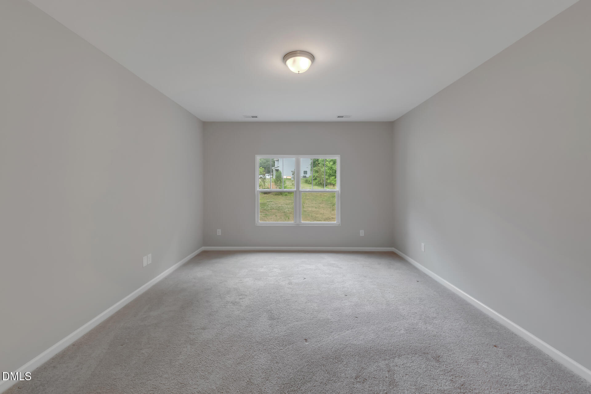 5317 Fayetteville Road, Unit A Durham, NC 27713 - Photo 29 of 50 an empty room with windows