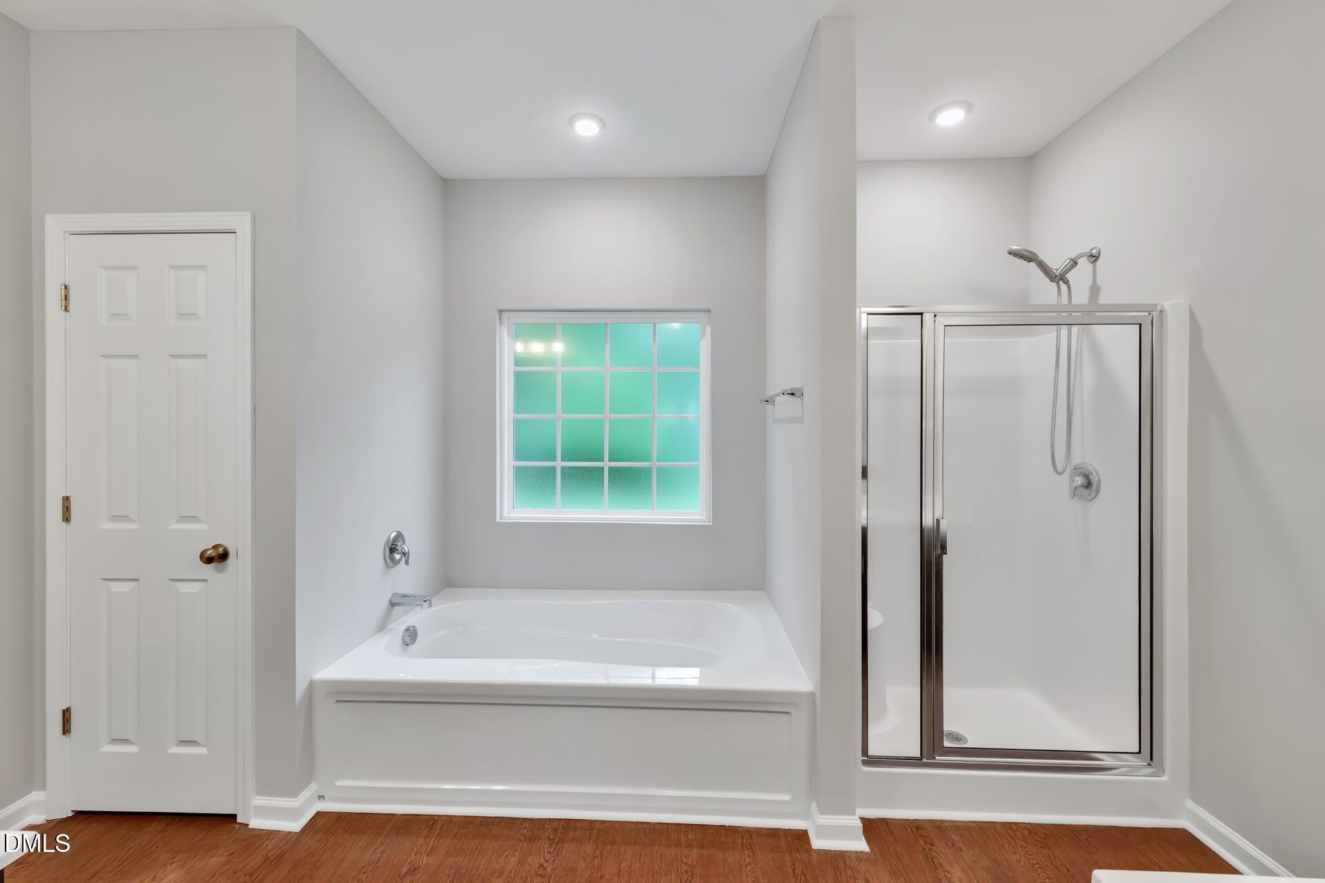 5317 Fayetteville Road, Unit A Durham, NC 27713 - Photo 32 of 50 a bathroom with a bathtub and a shower