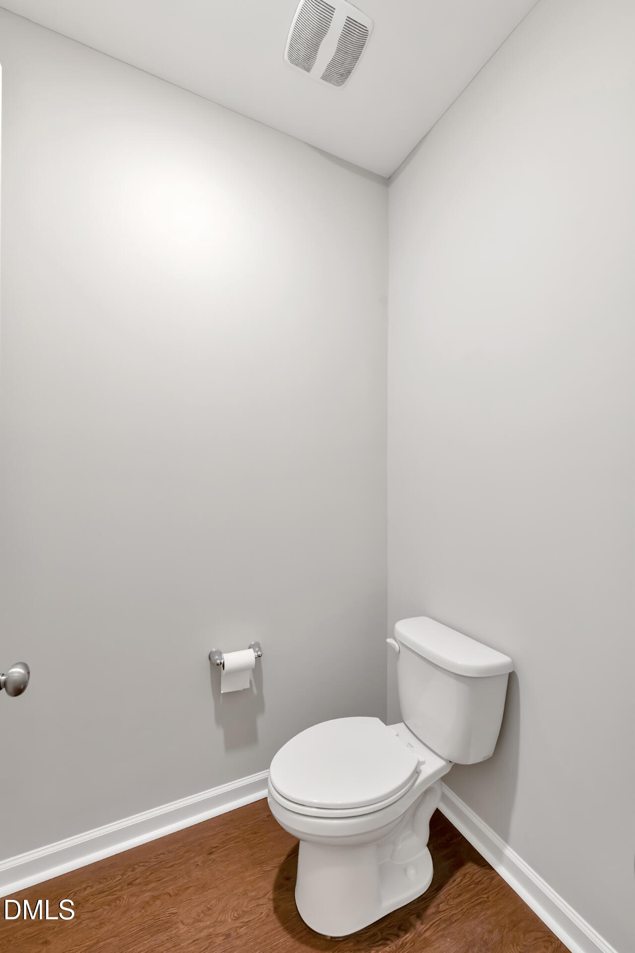 5317 Fayetteville Road, Unit A Durham, NC 27713 - Photo 35 of 50 a white toilet sitting next to a white cabinet