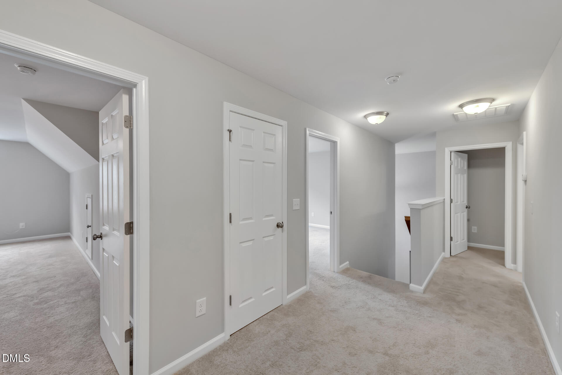 5317 Fayetteville Road, Unit A Durham, NC 27713 - Photo 36 of 50 a view of a hallway with closet and a bathroom