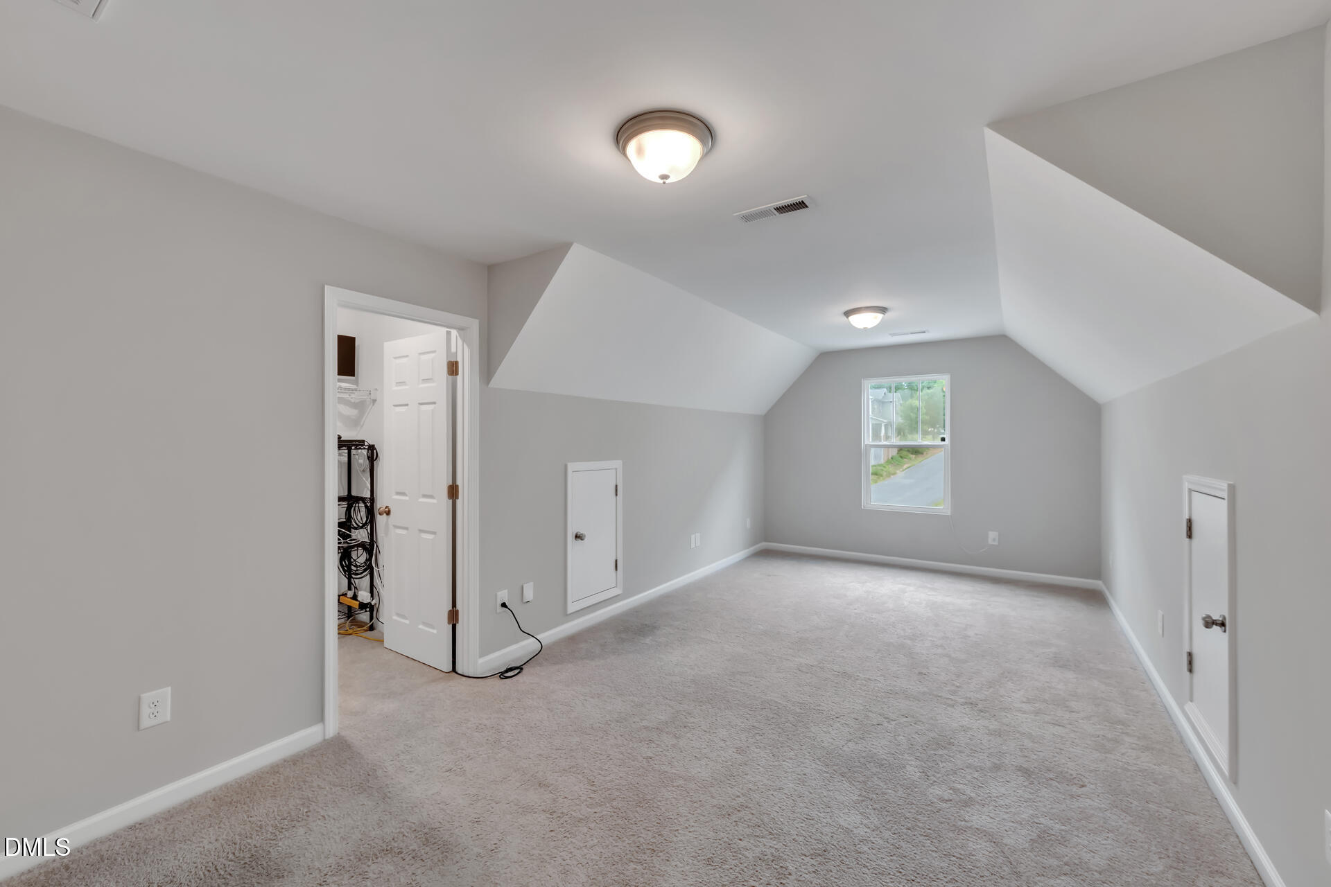 5317 Fayetteville Road, Unit A Durham, NC 27713 - Photo 37 of 50 an empty room with windows and closet
