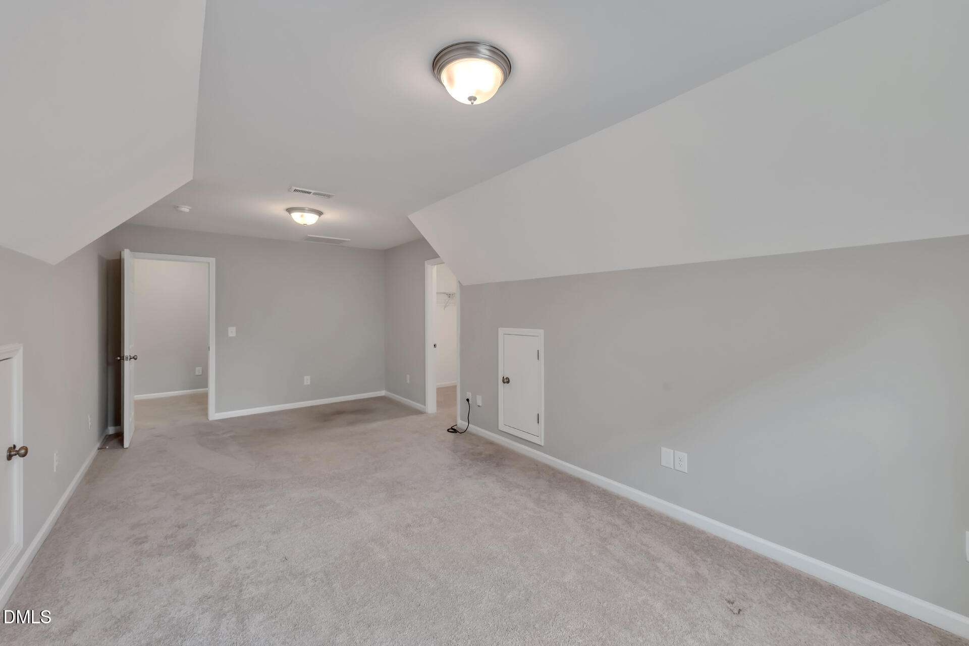 5317 Fayetteville Road, Unit A Durham, NC 27713 - Photo 38 of 50 an empty room with a ceiling fan and window