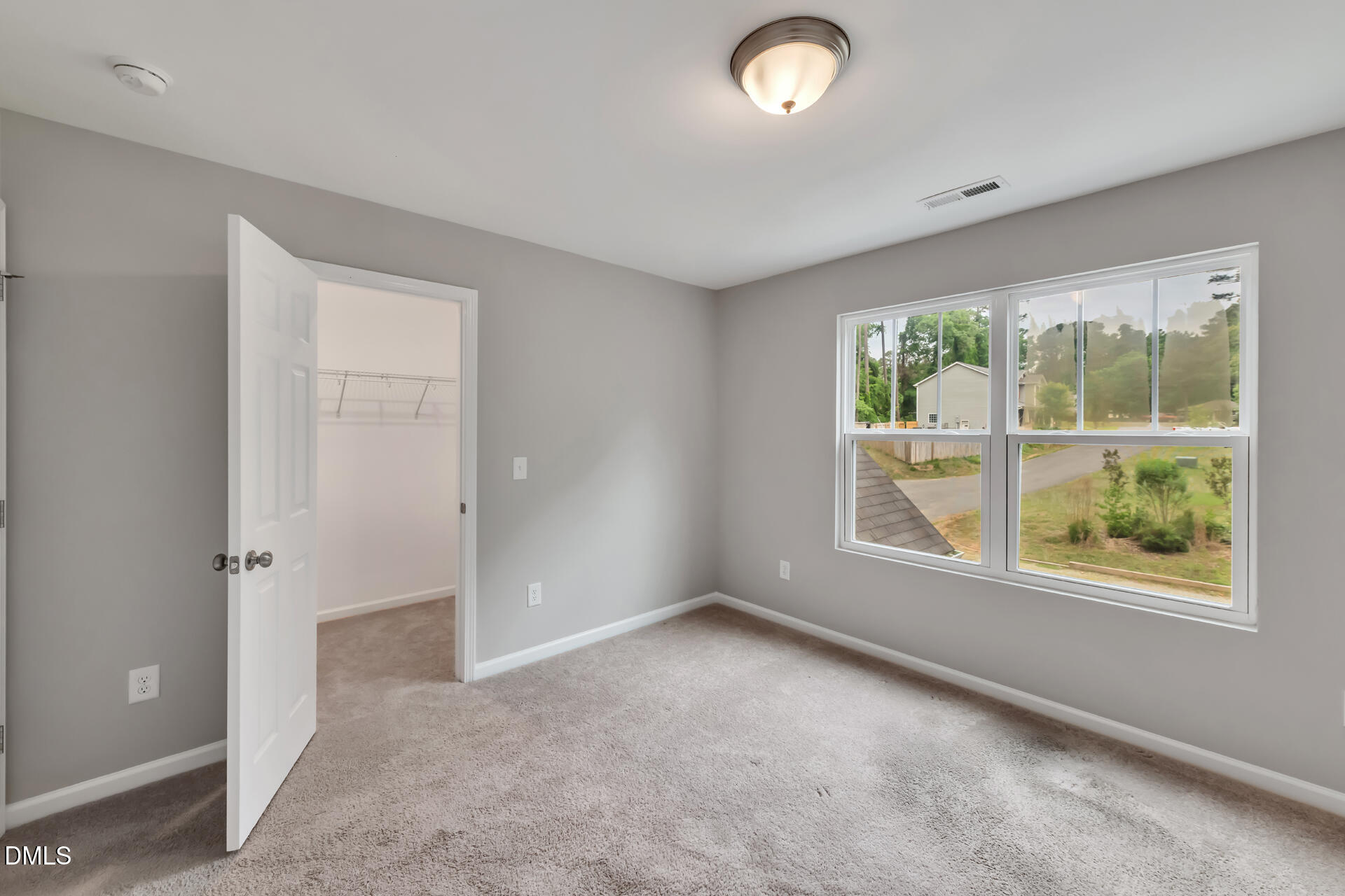 5317 Fayetteville Road, Unit A Durham, NC 27713 - Photo 43 of 50 an empty room with windows and closet