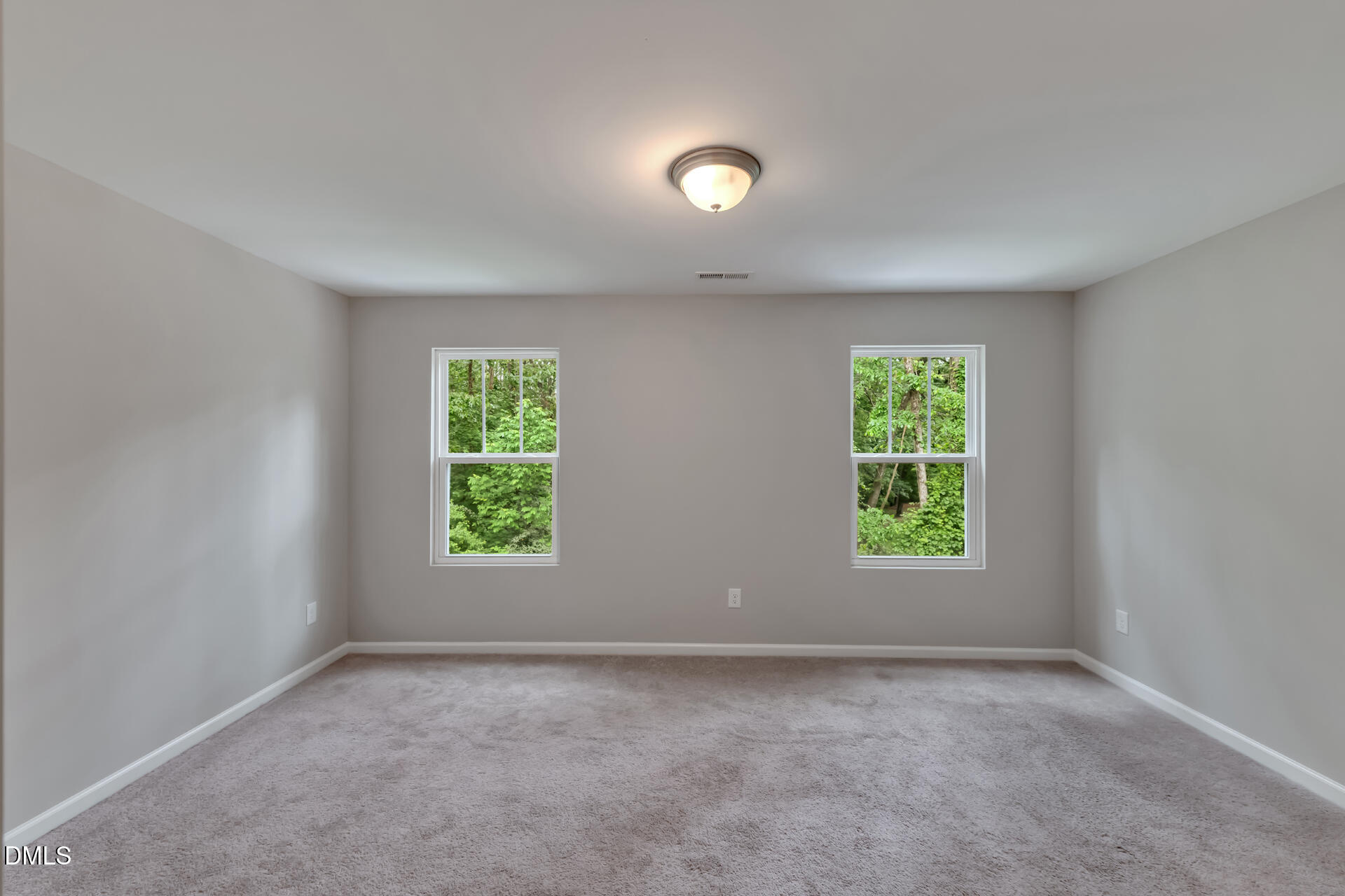 5317 Fayetteville Road, Unit A Durham, NC 27713 - Photo 46 of 50 an empty room with windows