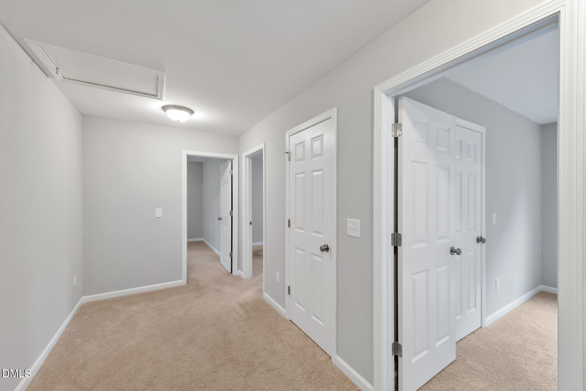 5317 Fayetteville Road, Unit A Durham, NC 27713 - Photo 49 of 50 a view of a hallway with closet and wooden floor