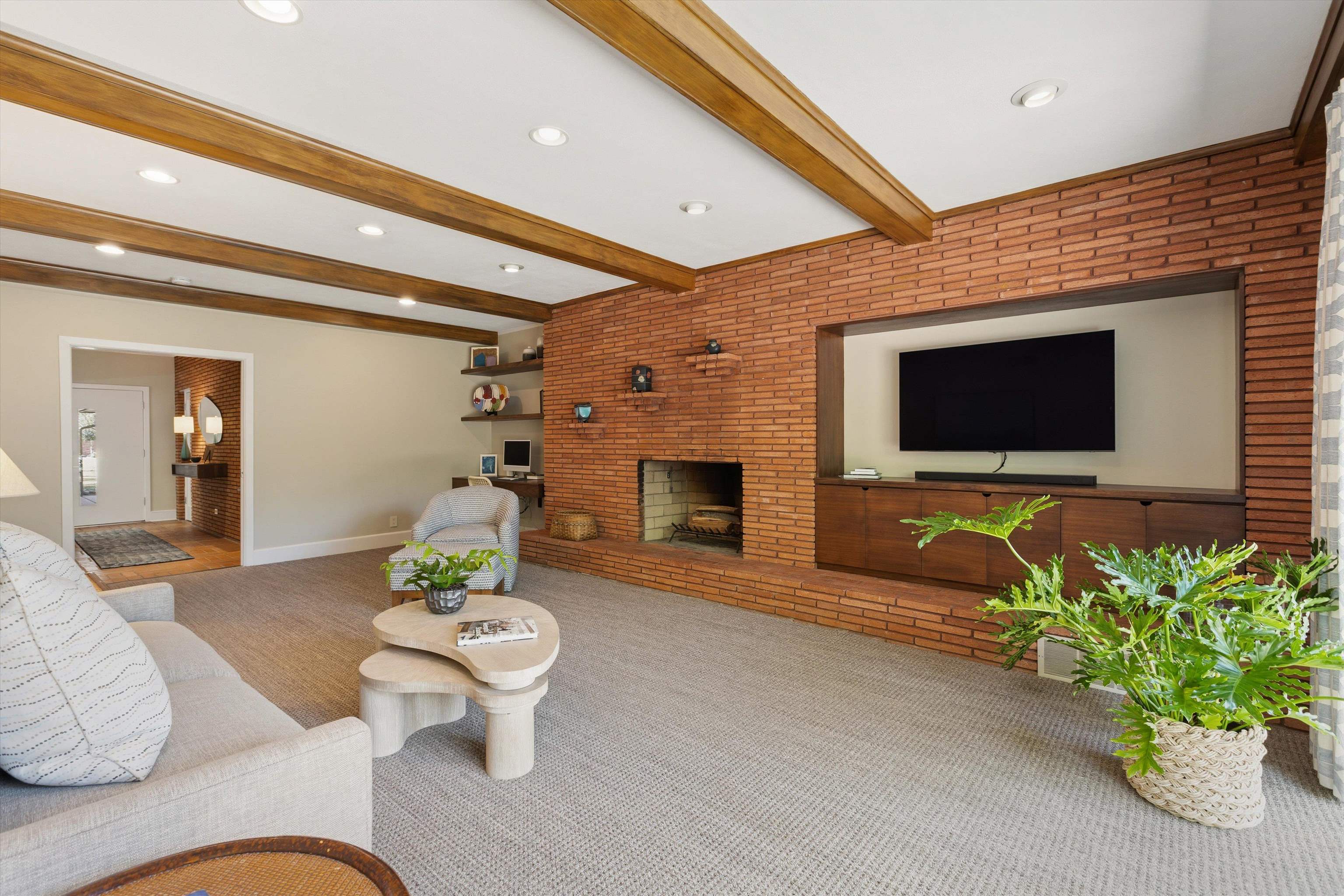 140 South Grove Park Road Memphis, TN 38117 - Photo 11 of 40 Den featuring a brick fireplace, beamed ceiling, and recessed lighting