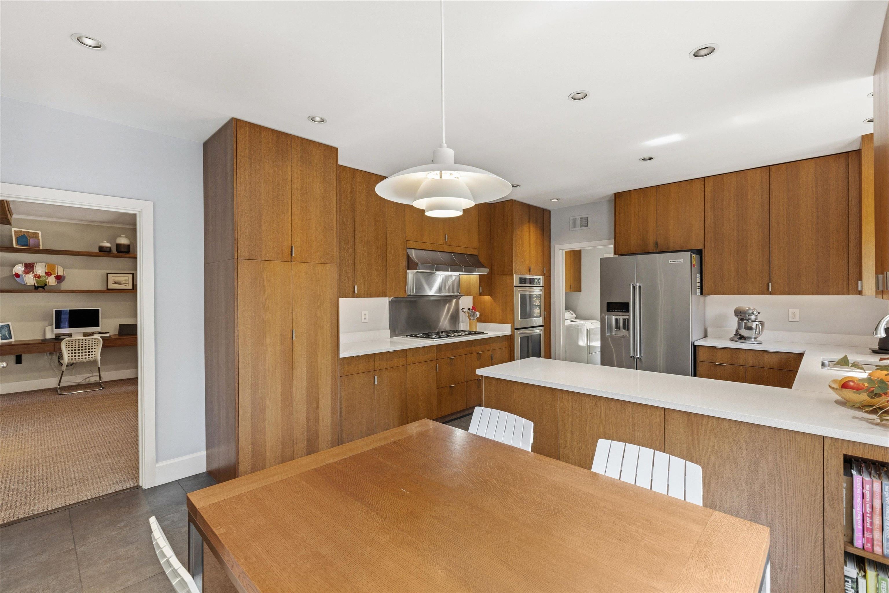 140 South Grove Park Road Memphis, TN 38117 - Photo 13 of 40 Kitchen with a peninsula, wood cabinets, stainless steel appliances, recessed lights