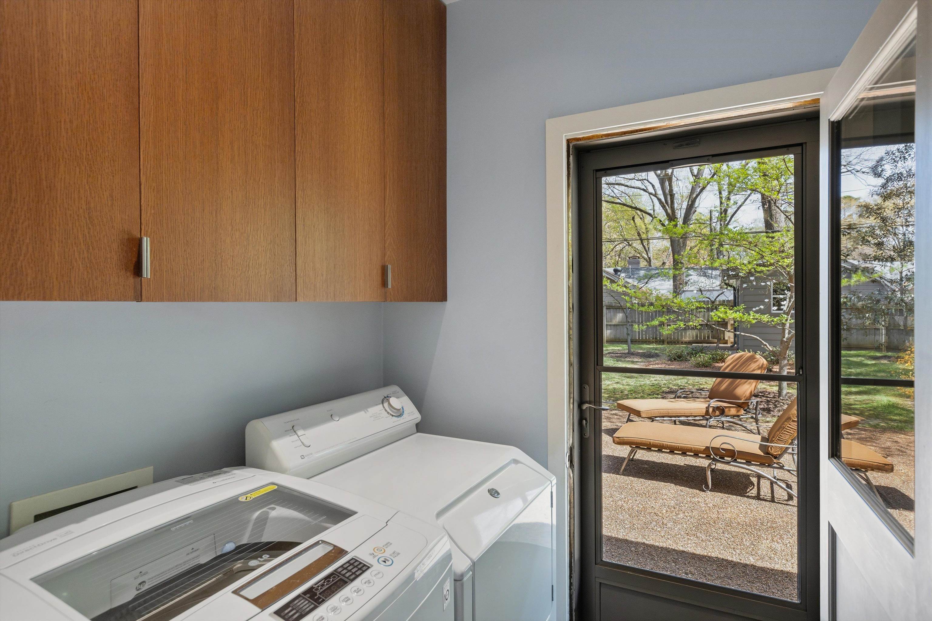 140 South Grove Park Road Memphis, TN 38117 - Photo 35 of 40 Laundry area with washing machine and clothes dryer and cabinet space