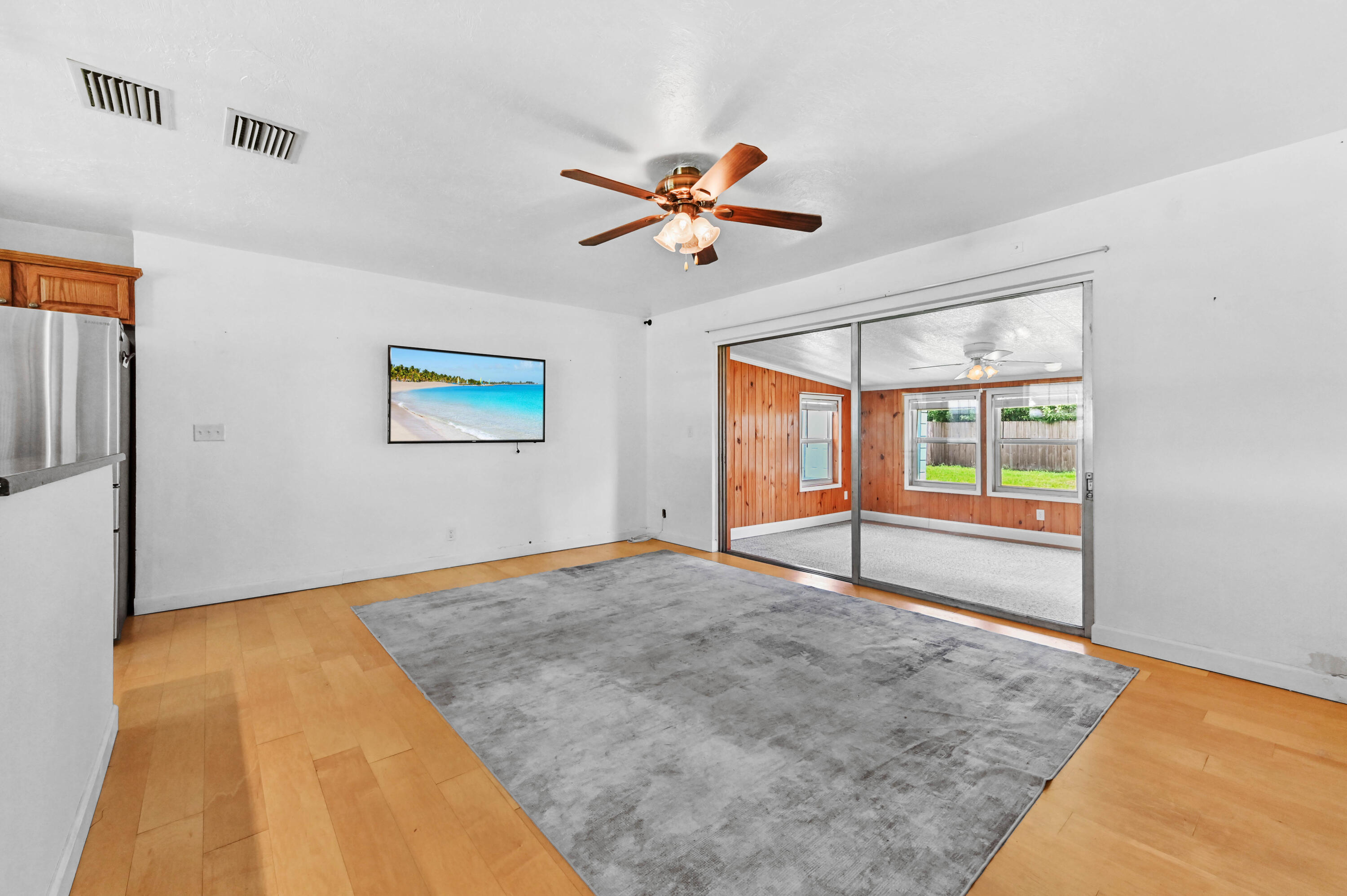 5709 Southeast Indigo Avenue Stuart, FL 34997 - Photo 8 of 26 a view of an empty room with window