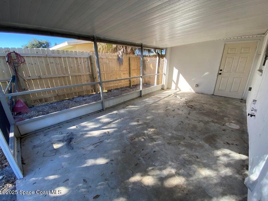 2801 Lorna Drive Melbourne, FL 32935 - Photo 21 of 25 a view of an empty room with a window