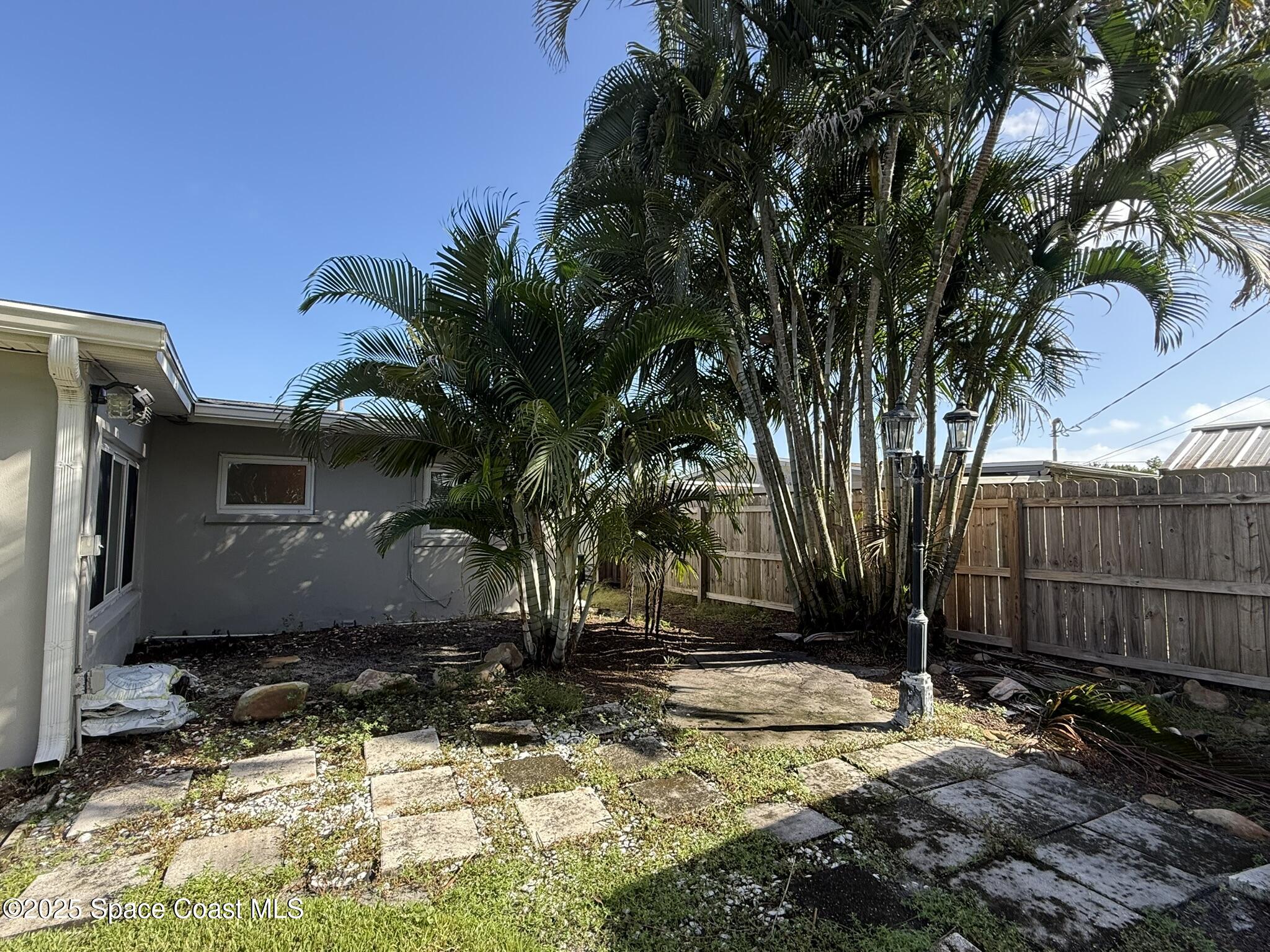 2801 Lorna Drive Melbourne, FL 32935 - Photo 24 of 25 a view of a backyard of the house